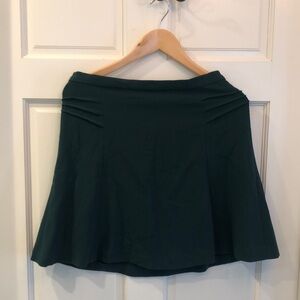 Cute green skirt.